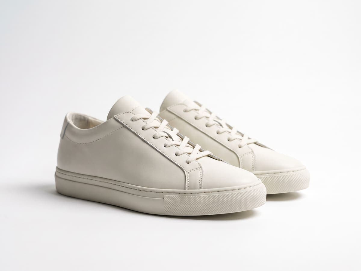 The same white sneakers on a clean white background with a soft shadow